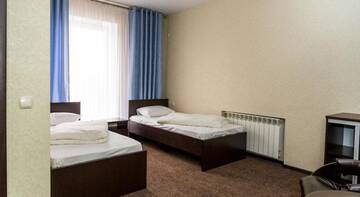 Фото номера Двухместный номер с 2 отдельными кроватями и ванной Гостиница Elion Hotel г. Балаково 6